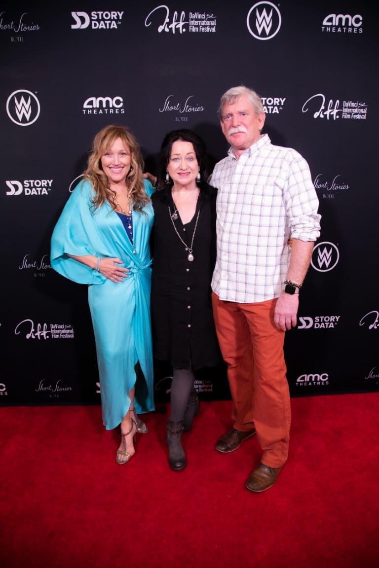 A photo of Tamara, Marc, and Holly on the Red Carpet.